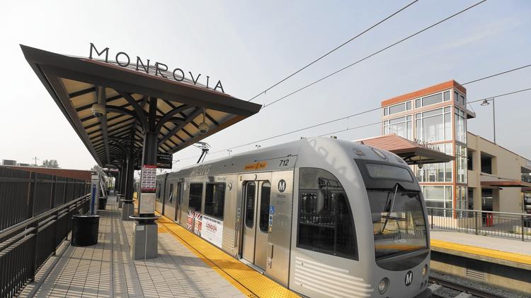 The Metro Gold Line departs Monrovia's Station Square during testing. The city recently completed $25 million worth of infrastructure improvements and new facilities, including a park and band shell at the square. (Allen J. Schaben / Los Angeles Times)