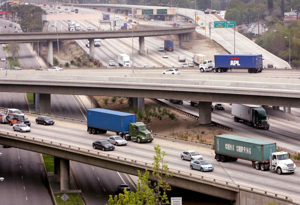 Car and truck traffic flows through the interchange of the 60 and 57 freeways in Diamond Bar. (File photo) 