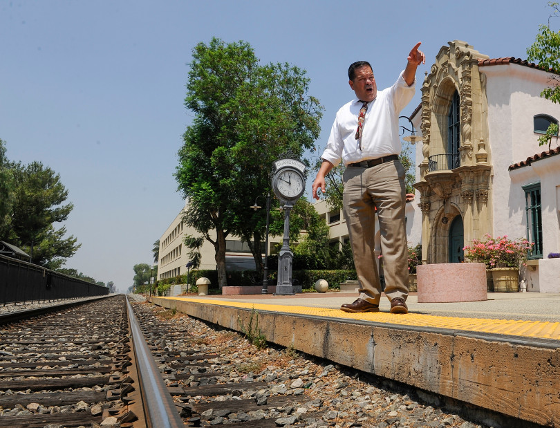 Claremont City Councilman Sam Pedroza shows the tracks at the Historic Claremont Depot where the Gold Line station is proposed to be on Thursday on June 29, 2017. (Photo by Keith Durflinger/San Gabriel Valley Tribune/SCNG)